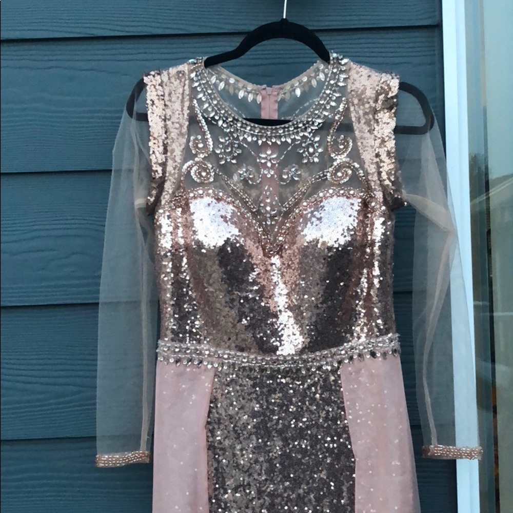 Evening dress with skin tone sleeves